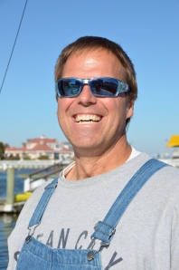 Family, dedication to his work, and being aboard his 50' Henriques makes Dr. Mike a very happy man.
