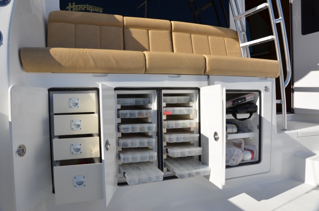 The ample tackle center is located below the mezzanine couch and is a focal point of the boat's business end.